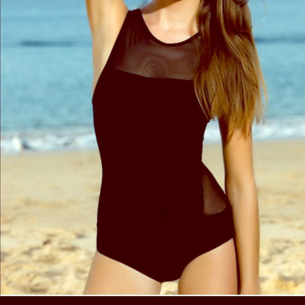 Open back black one piece
